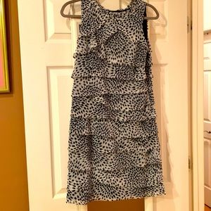 Lined white layered dress/blck all-over print. Not worn,no tags. Hidden side zip